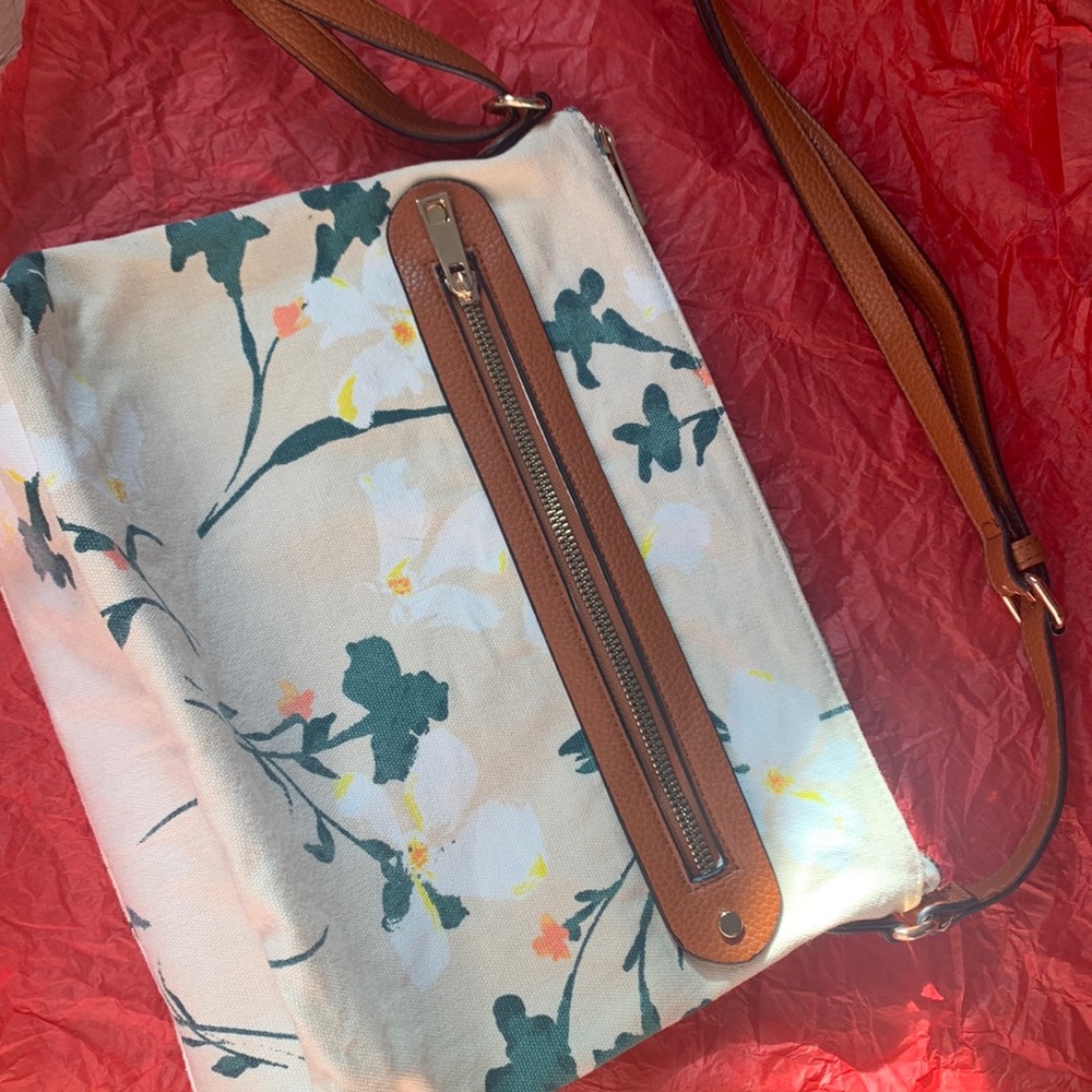 A New Day floral body bag.